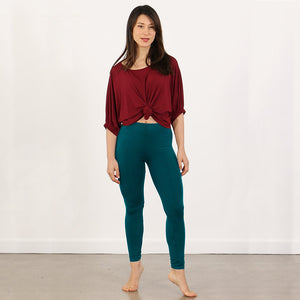 women wearing coloured leggings, blue leggings, yellow leggings, pink leggings, grey leggings