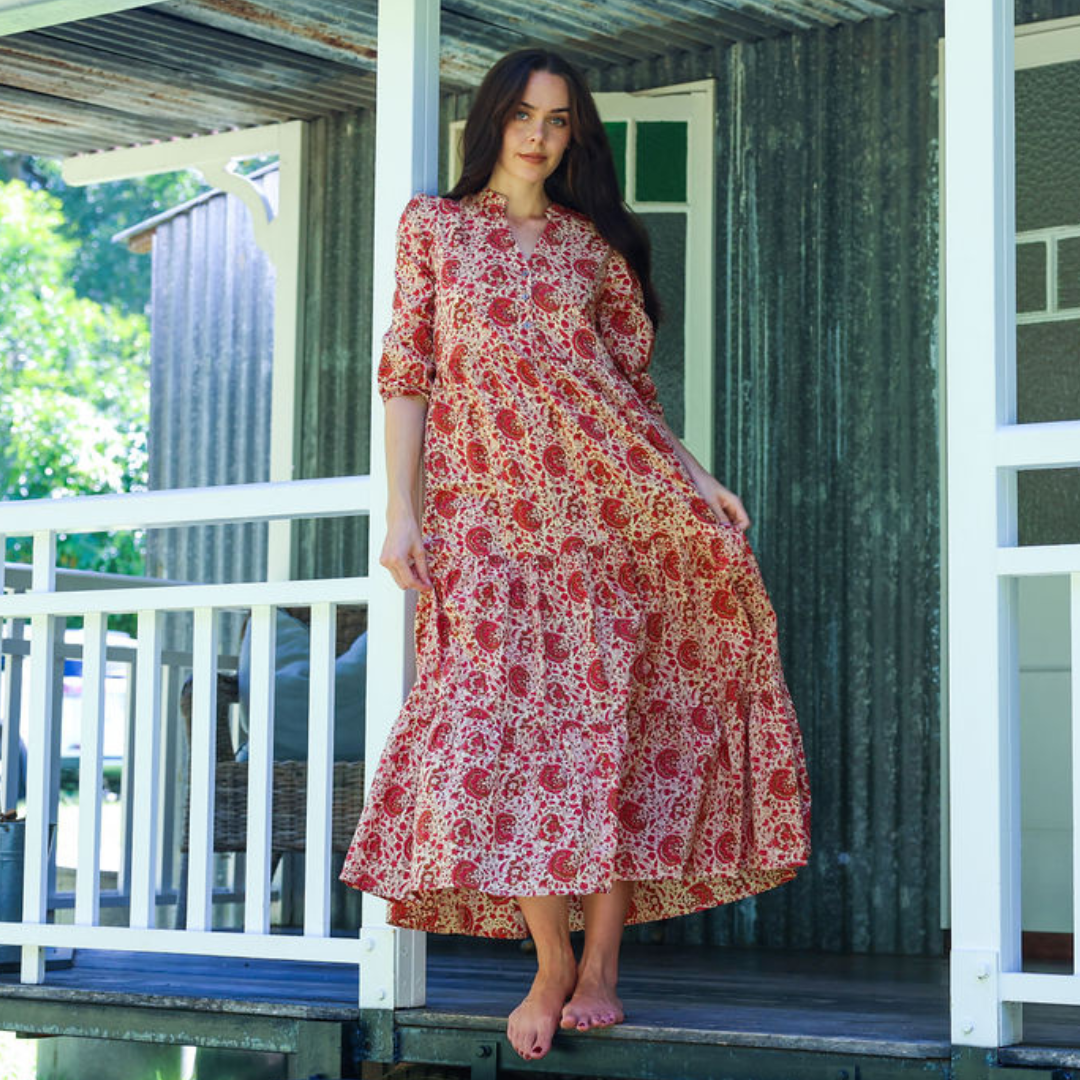 model wearing a rose cotton long sleeve dress