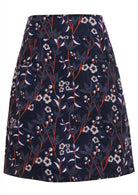Cotton corduroy retro floral print on dark blue base A-line above knee length skirt with pockets