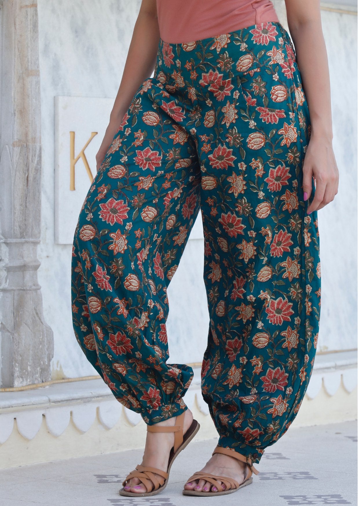 Genie style 100% cotton pants in pink, orange and cream florals on deep green base