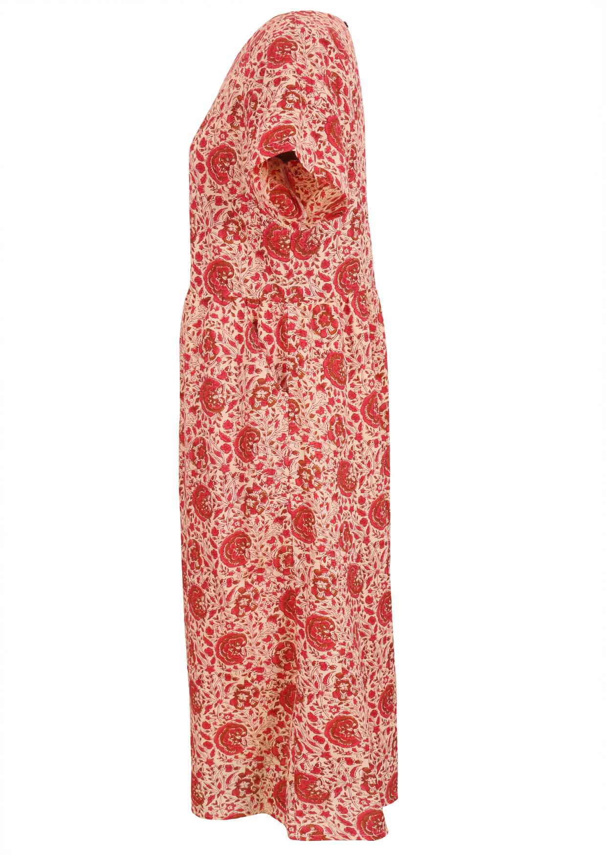 Side view of fully lined relaxed fit cotton dress with short t shirt sleeves and pockets in cream based warm floral print