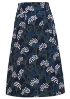 Belt loop skirt features back pockets and a side zip.