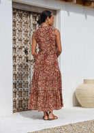 Lightweight cotton sleeveless boho maxi dress with floaty skirt, hidden side pockets and mandarin collar.