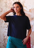 woman in navy blue rayon loose fit t-shirt
