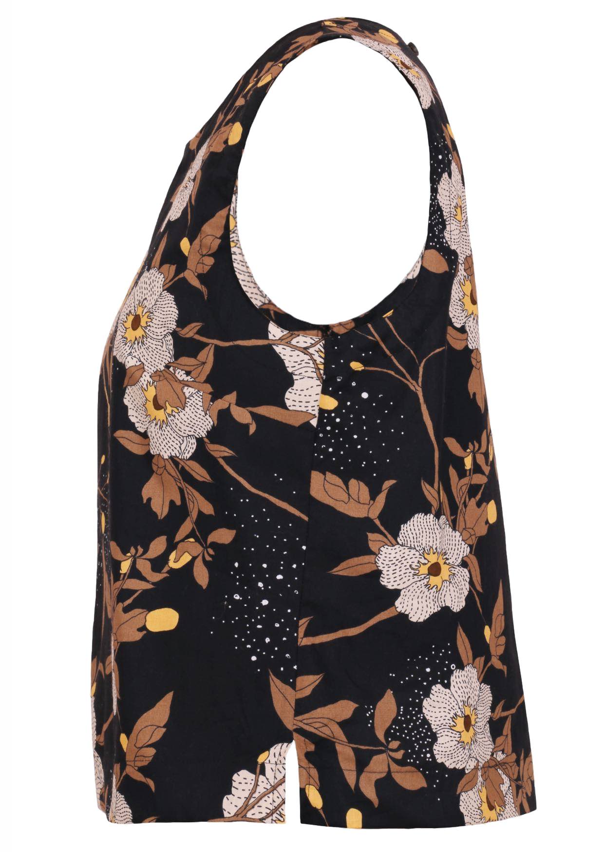 side view of black based floral print cotton sleeveless top.