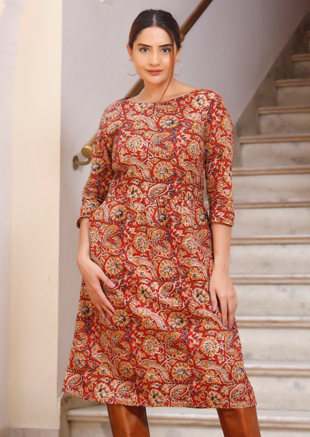 Relaxed fit, knee length cotton dress in earthy floral print.