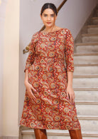 Relaxed fit, knee length cotton dress in earthy floral print.