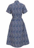 Back mannequin photo of cotton shirt dress with short sleeves and wide fabric waist tie with two belt loops and hidden side pockets