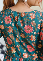 Green floral printed cotton dress with short sleeves and keyhole button closure at the back