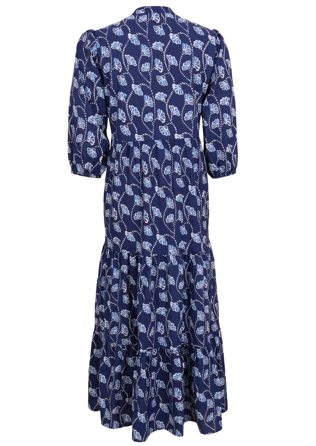 Back view of a full length maxi dress with 3 tiered flowy skirt, mandarin collar, buttoned bodice and pockets