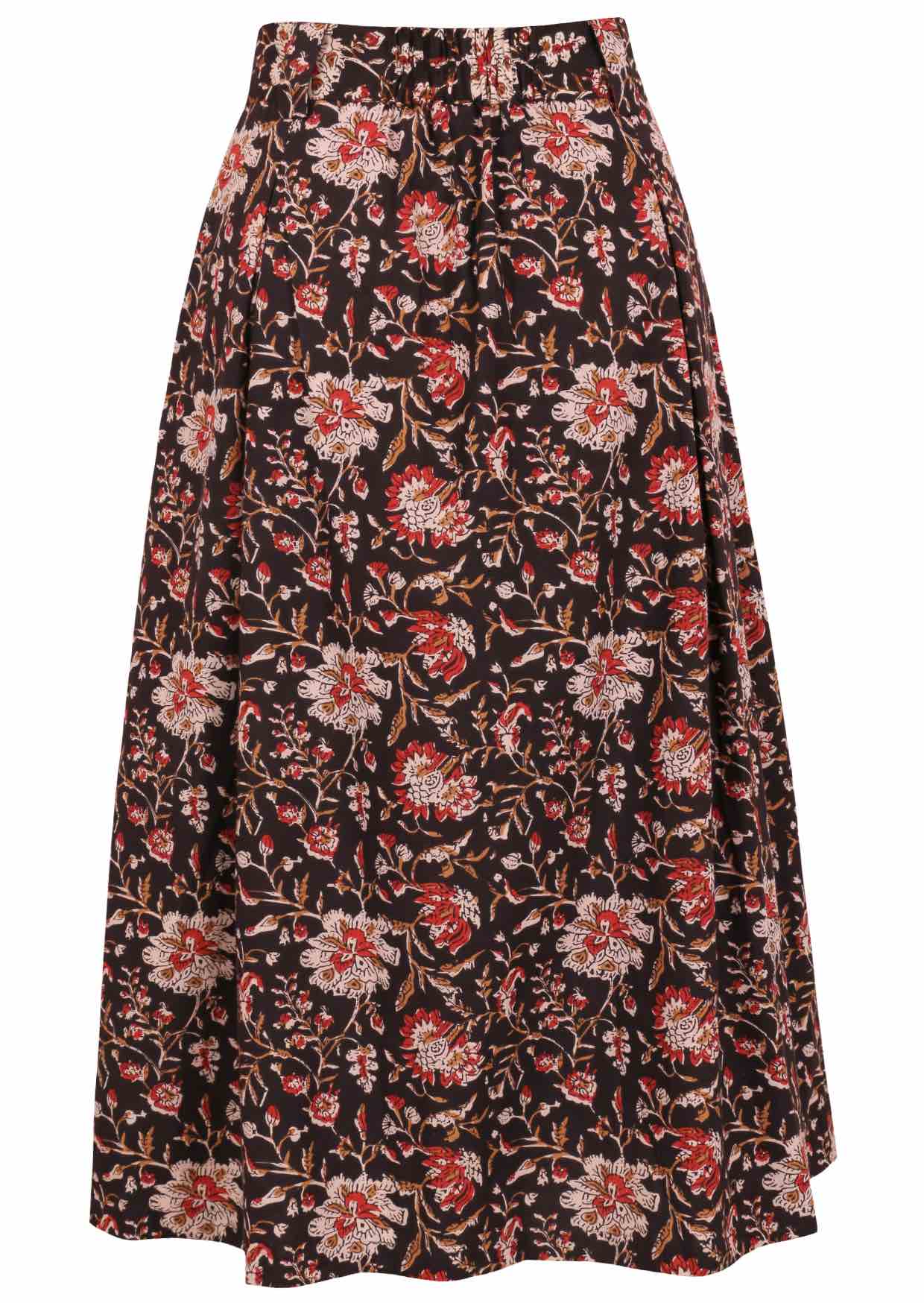 Black based traditional Indian floral print cotton skirt on a white background.
