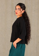 Double cotton top in basic black looks great over jeans