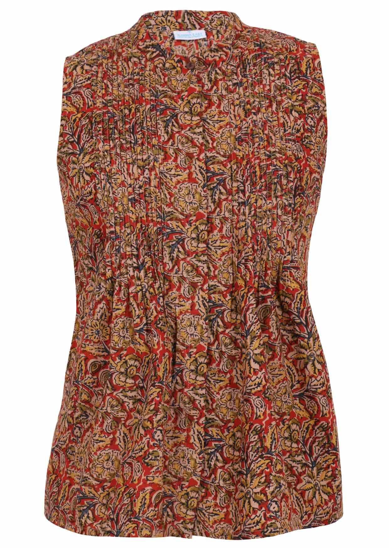 This front view shows a warm floral print sleeveless blouse with button-up collar, vertical pleats, and a fitted cut that flares slightly at the waist