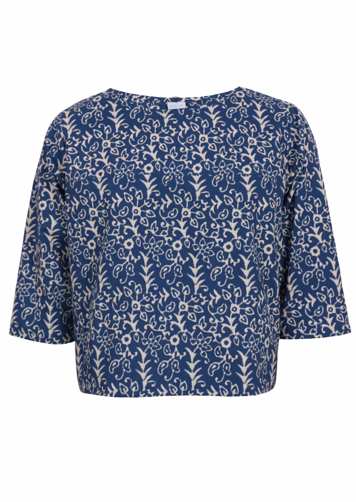 Front mannequin photo of cotton 3/4 sleeve boxy top with navy base and off white floral print