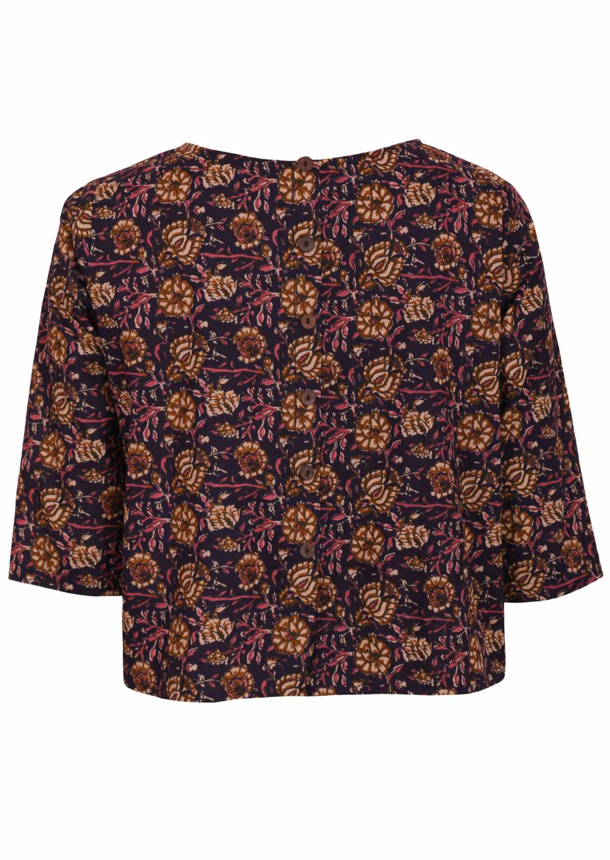 Loose fit cotton top with 3/4 sleeves and decorative buttons down at the center of the back.