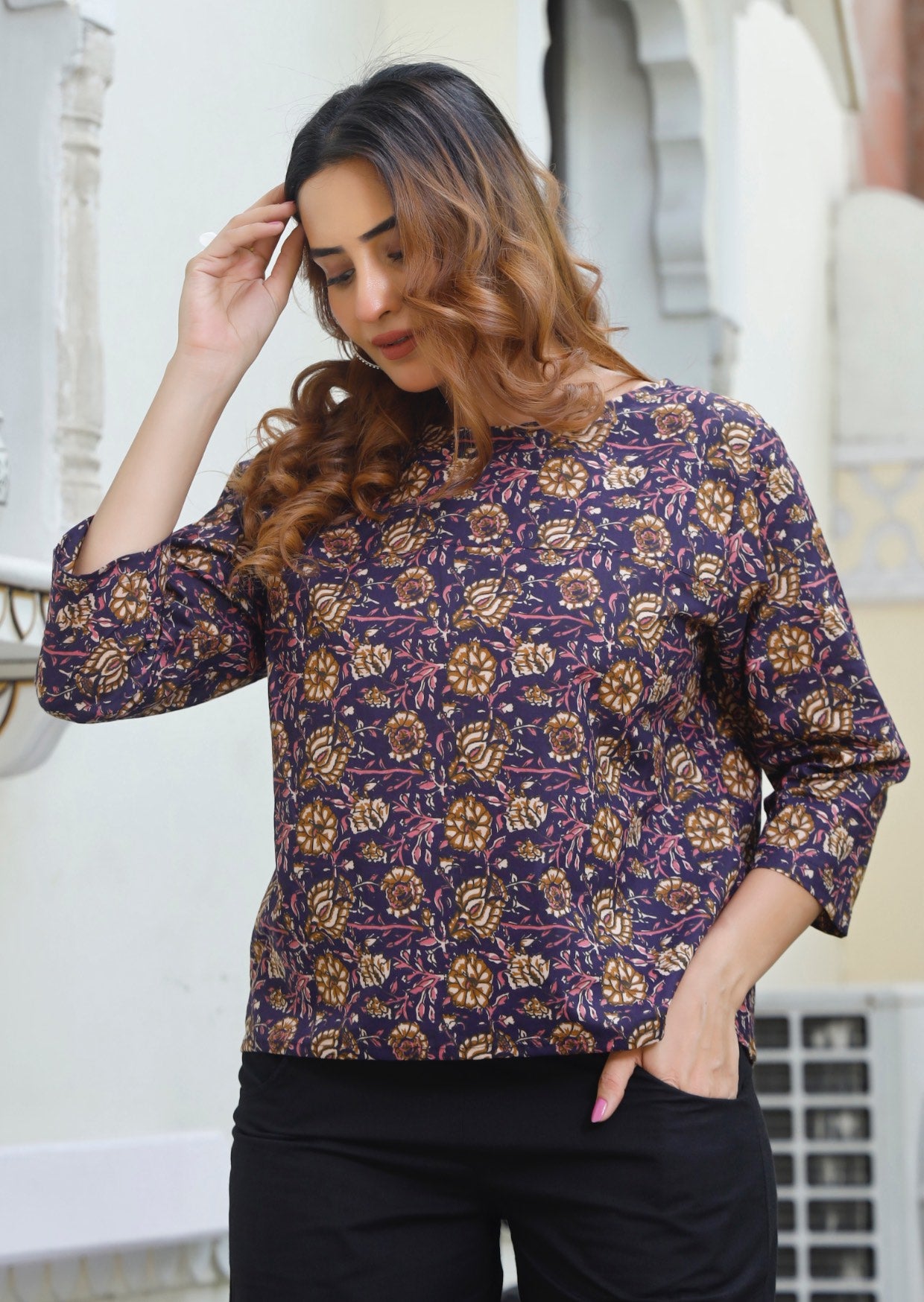 Lightweight 100% cotton top in dark purple with wide round neckline and 3/4 sleeves.
