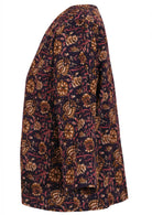 Side image of relaxed fit cotton top with 3/4 sleeves and round neckline.