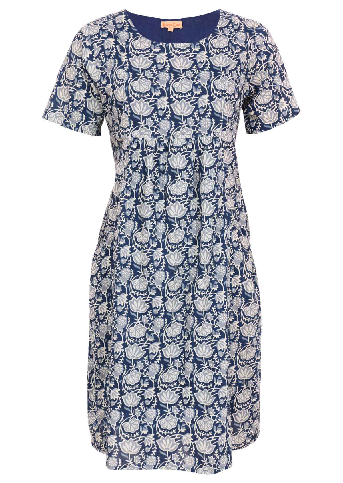 Mannequin front of dress.