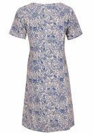 White based blue floral printed cotton dress with white background.