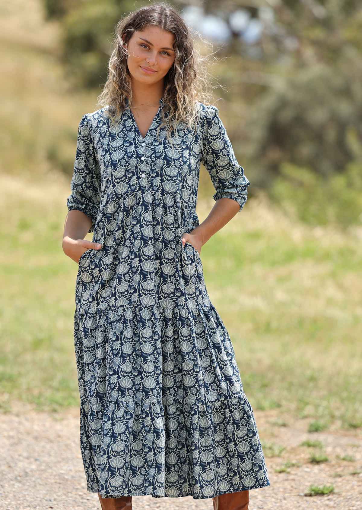 woman with hill in background wearing block print cotton maxi dress in Indigo