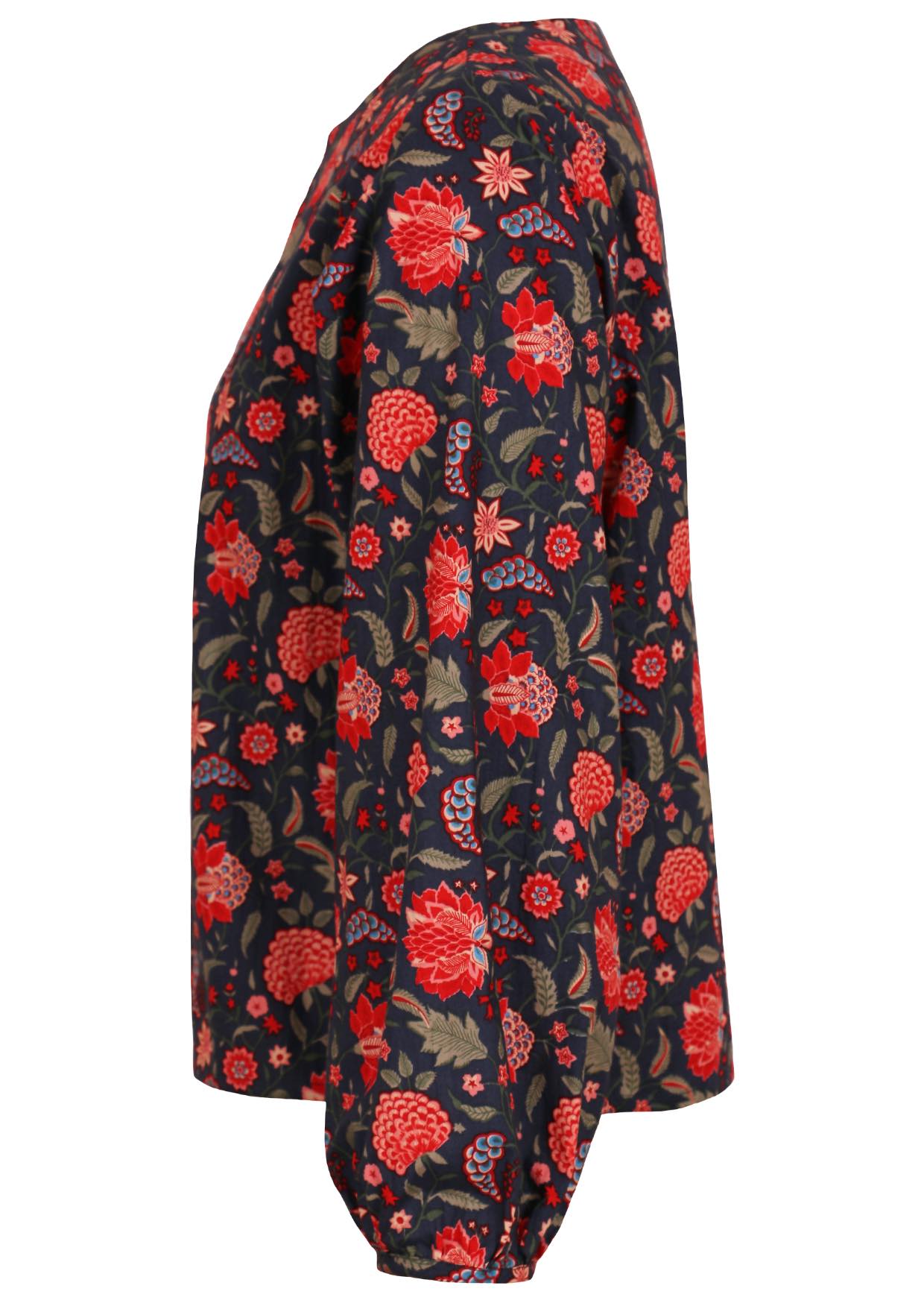 Cotton long sleeve top with boat neckline and bishop sleeves, in floral print on a blue base