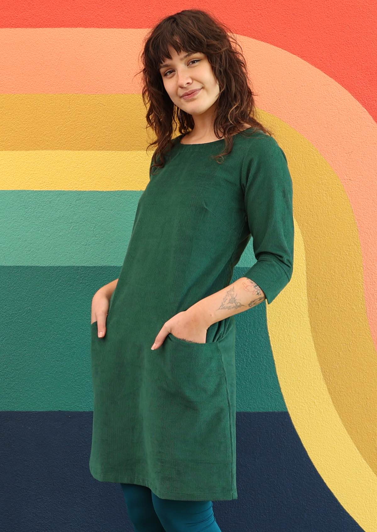 Gorgeous green cotton corduroy dress sits above knee