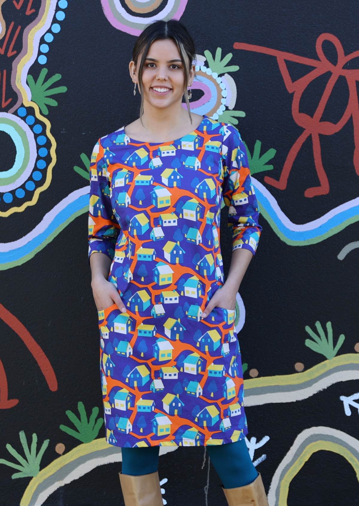 Model in Jamie Dress round neck 3/4 sleeve pockets cotton house print