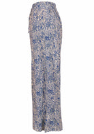 White based blue floral print cotton pant with white background.