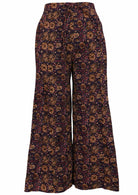 Wide leg 100% cotton pants in sweet floral print on dark purple base.