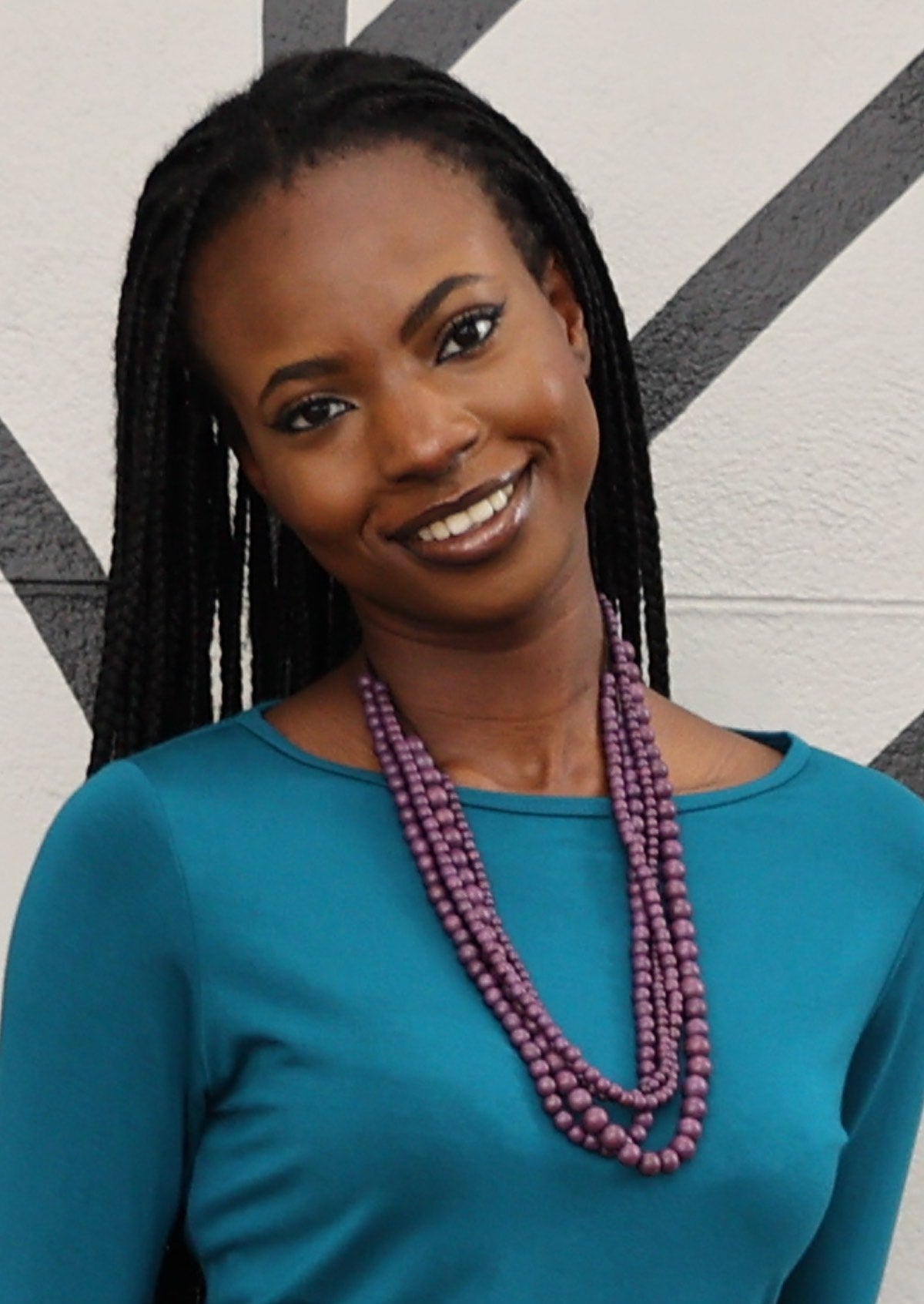Plum coloured wooden beads in four strands