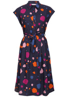 Navy based cotton dress with colourful abstract pattern, cap sleeves, buttoned bodice, collar and waist tie