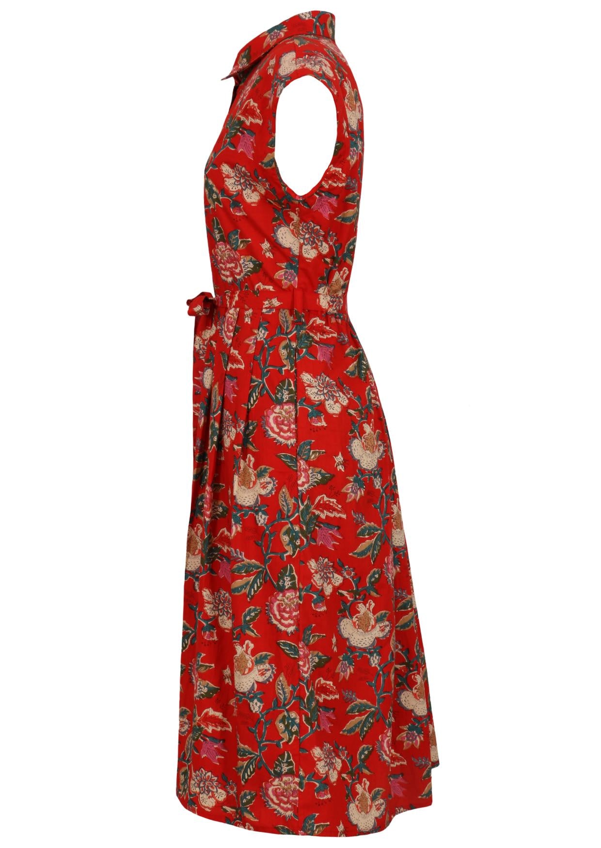 Side view of red based floral print cotton dress with pockets.