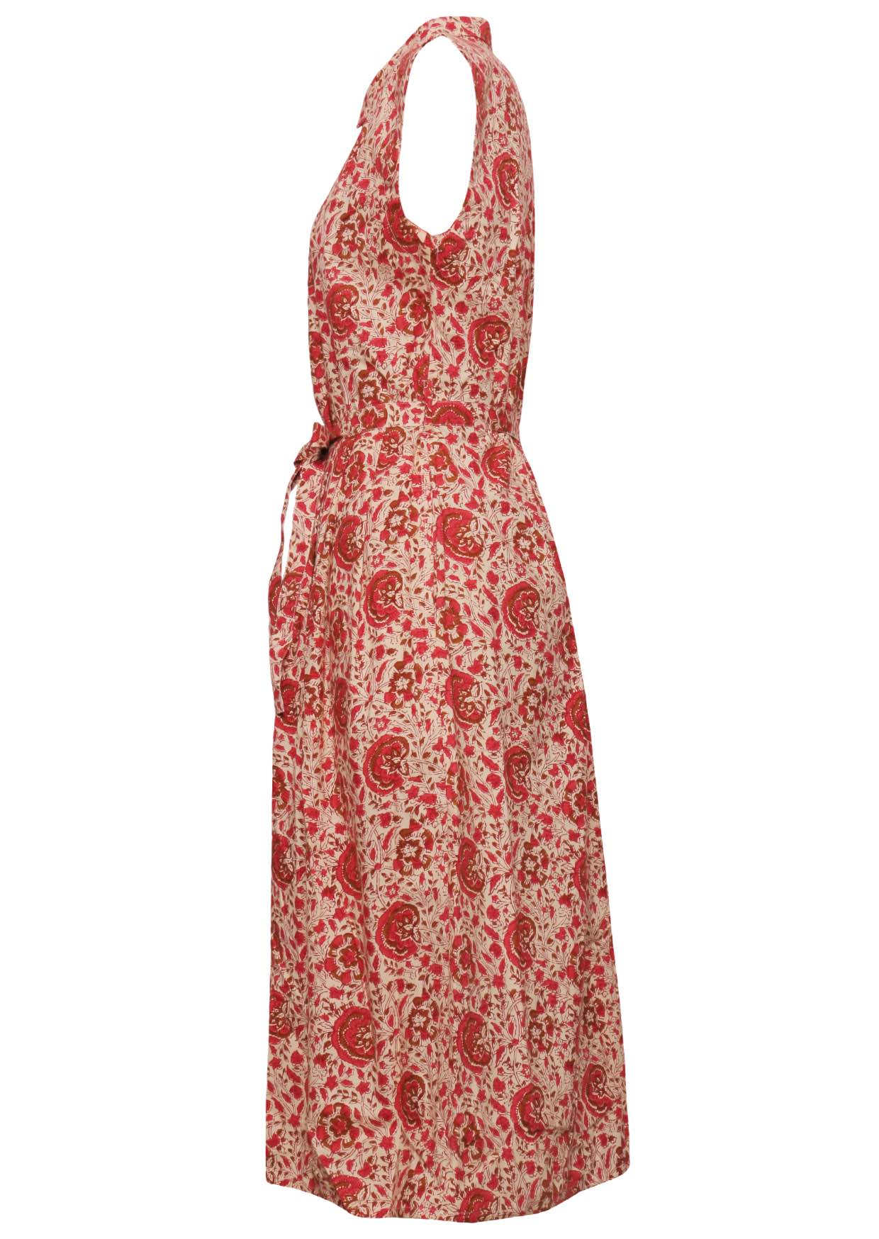 Side view of cream based floral print cotton dress with pockets.