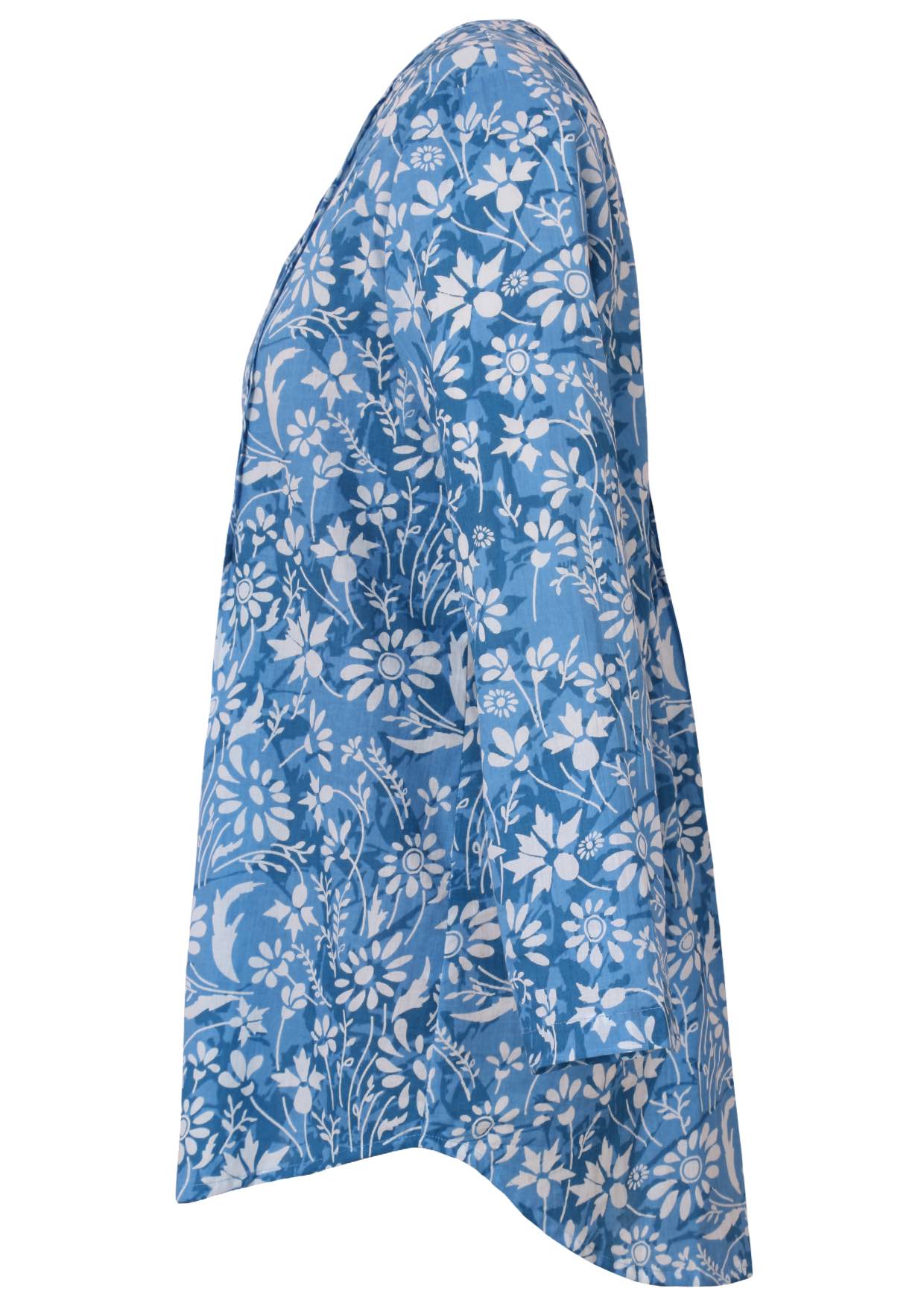 Blue floral button through shirt with long sleeves that is longer at the back