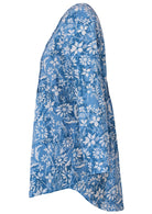 Blue floral button through shirt with long sleeves that is longer at the back