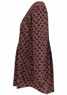 Dark purple Long sleeve cotton top with printed floral print in cream, pink and light brown.