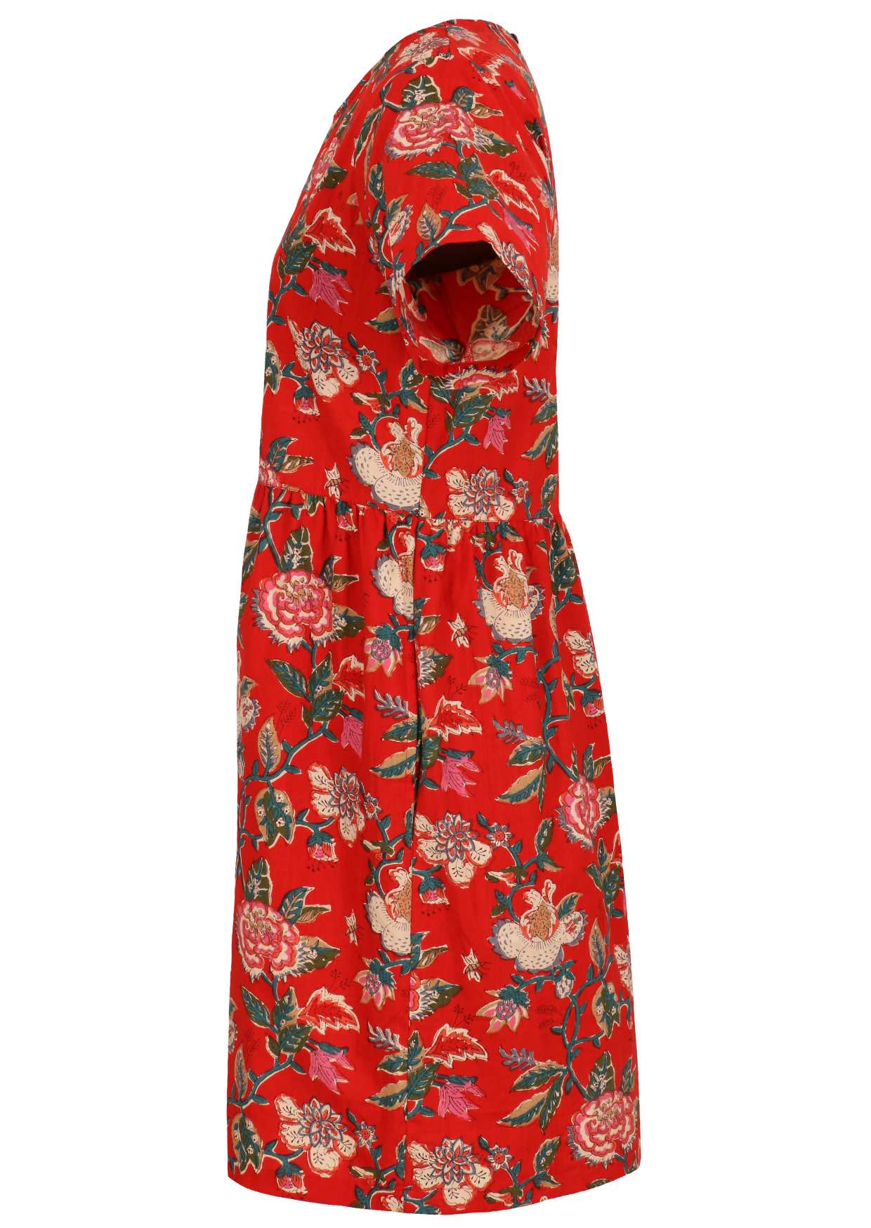 Side view of loose fitting cotton dress in Red with short sleeves and hidden side pockets