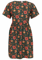 100% cotton loose fit dress with high round neckline, pockets and short sleeves.