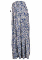 White based blue floral print cotton skirt on a white background.
