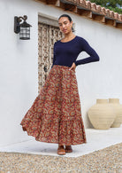 Model wearing 100% cotton maxi skirt with elasticised waist and drawstring in Indian floral print.