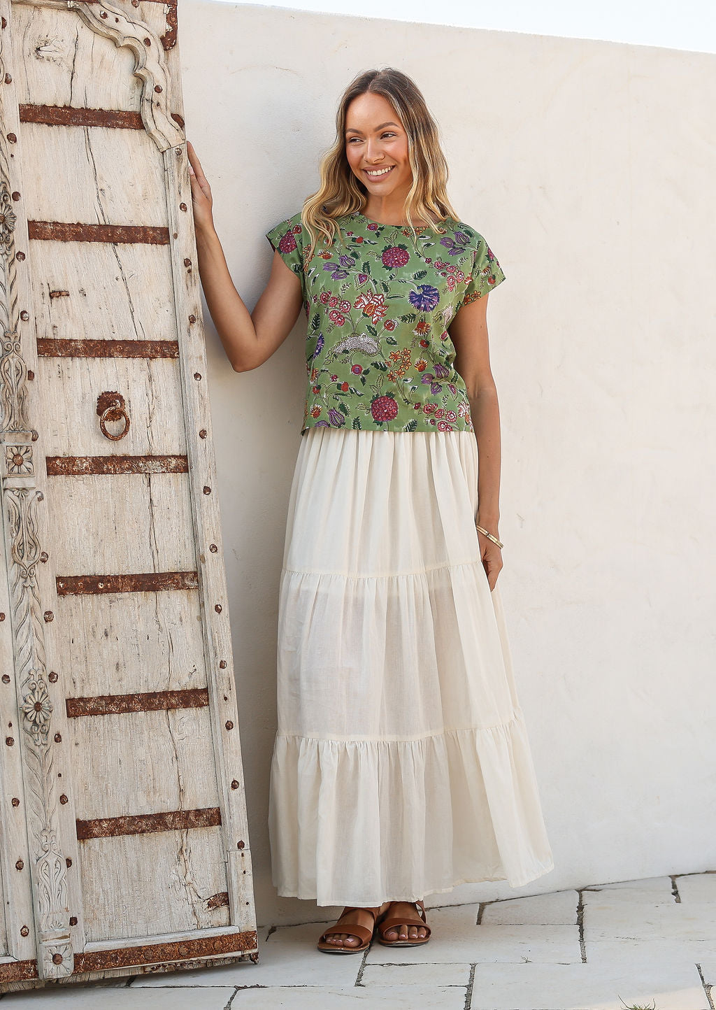 Woman wearing a Maxi Skirt in plain white colour, 100% cotton skirt with drawstring waistband