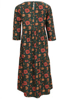 Back view of 100% cotton tiered maxi dress with 3/4 sleeves, pockets and button at nape of neck .