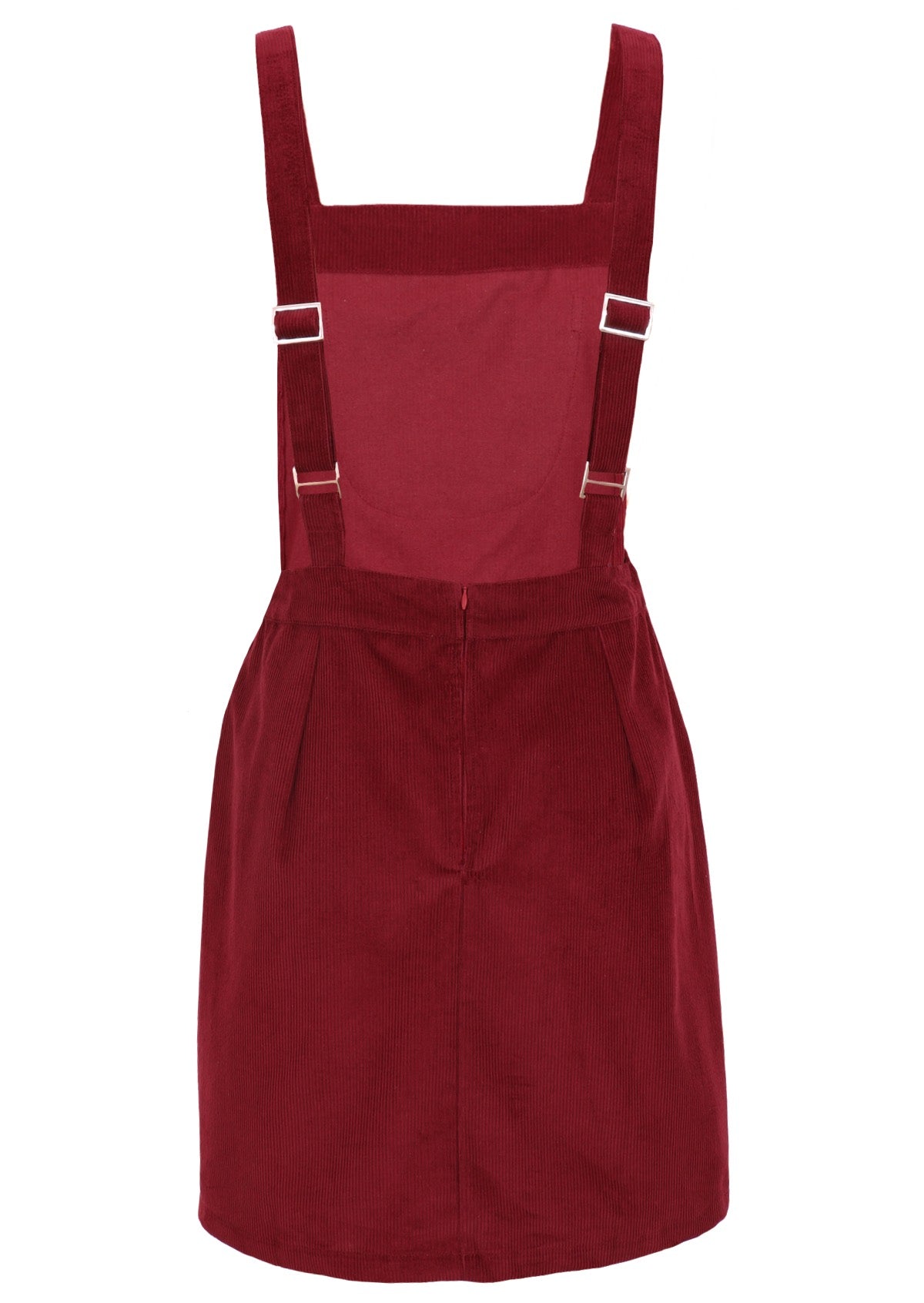 Red pinafore made from 100% cotton ends above the knee.