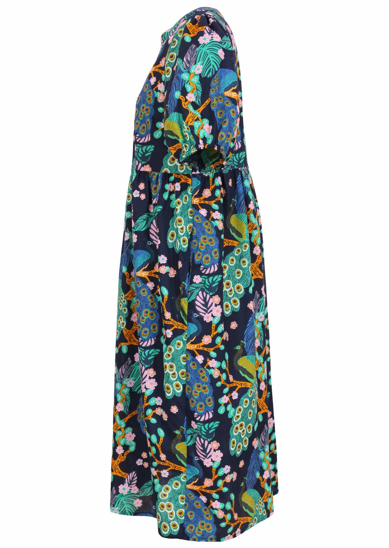 Side view of navy blue floral printed cotton midi length button through dress with hidden side pockets.