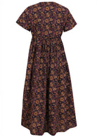 Back image of floral printed maxi dress in dark purple with pockets and a waist tie.