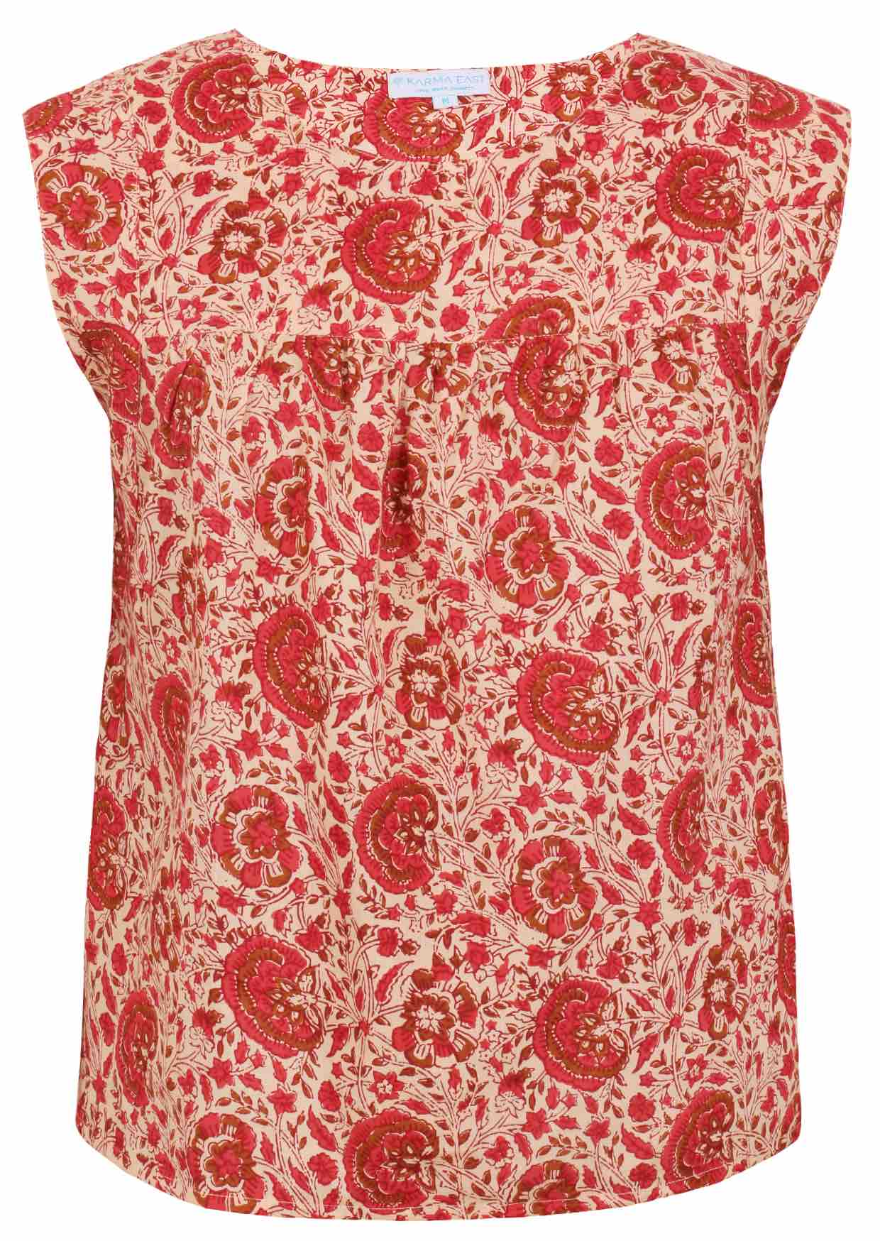Cap sleeves cotton top with cream based warm floral print on a white background.