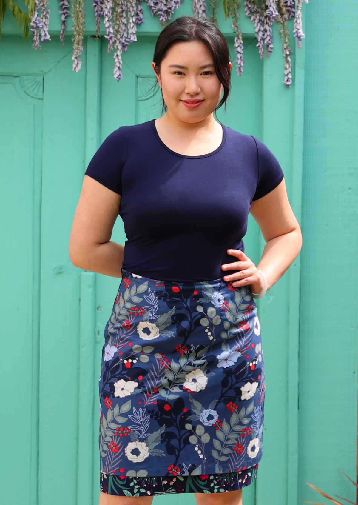 Model wear bold blue floral print cotton  reversible skirt 100 percent cotton