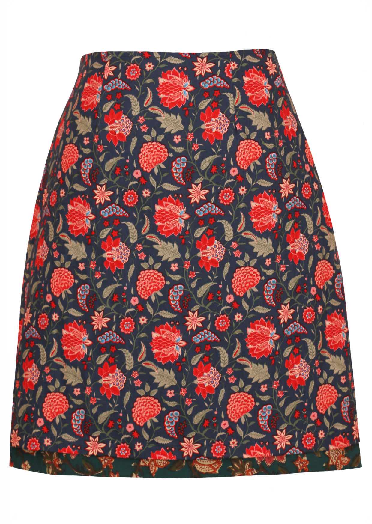 Cotton knee length reversible skirt with side zipper and pop of floral print band at the base.