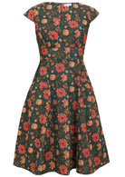 Retro Style cotton dress with A line fuller skirt, and piped details at waistband and pockets.