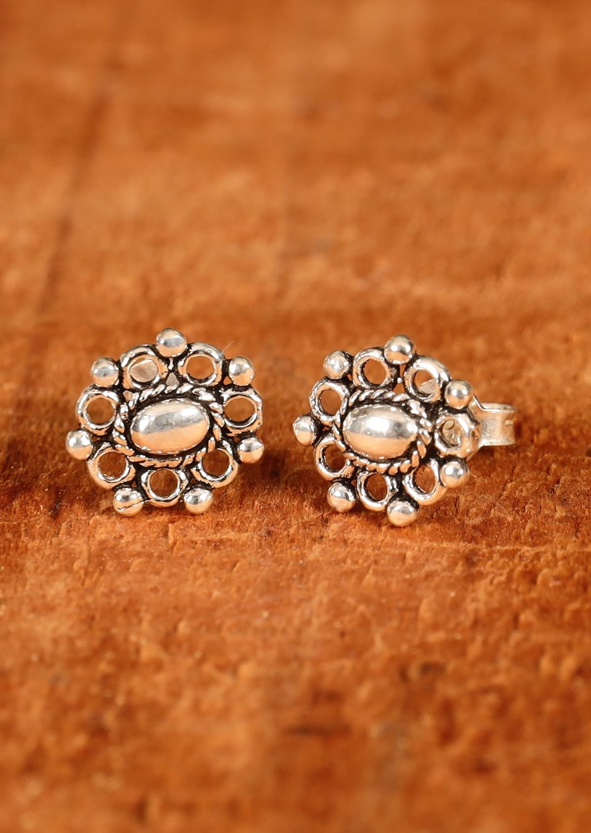 Sterling silver stud earring 10mm wide and 11mm long with 11mm post and butterfly back